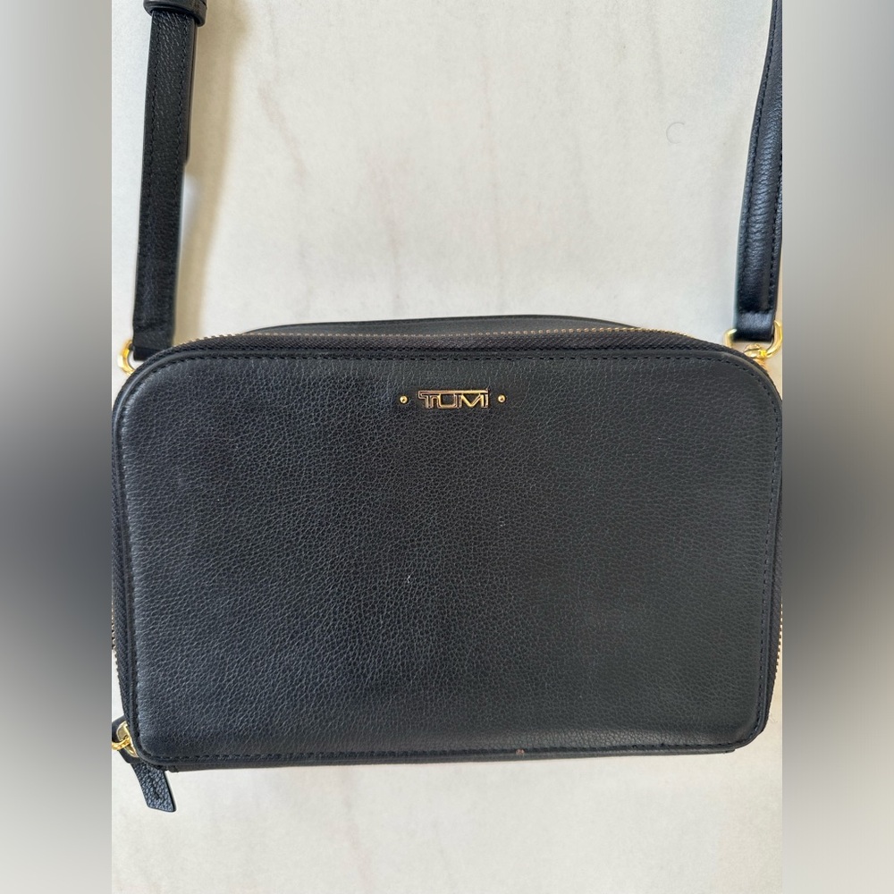 Tumi leather crossbody bag